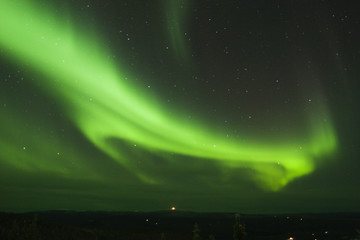 Wall Mural - loop of northern lights in the night sky