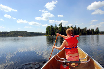 child in canoe