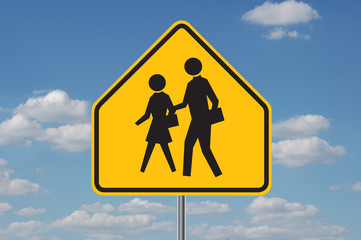 school warning sign with clouds