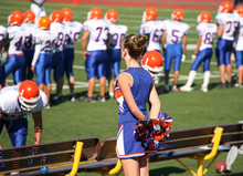 Cheerleader At Football Game