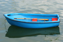 Empty Blue Rowing Boat