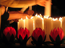 Lighting Candles On Buddha's Birthday