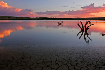 Poster - sunset over water