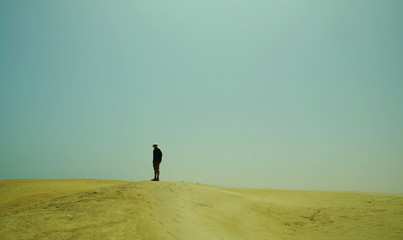 Wall Mural - alone men in the desert