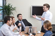 © endostock - man making presentation  the group in an office