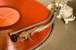recordplayer with red lp records (33 1/3 rpm)