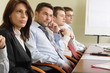 © endostock - business team at long ,boring meeting in the office