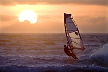 Windsurfer And Setting Sun