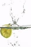 Fototapeta Kuchnia - lemon splashing water