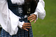 Playing The Bagpipe
