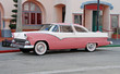 classic automobile in pink color