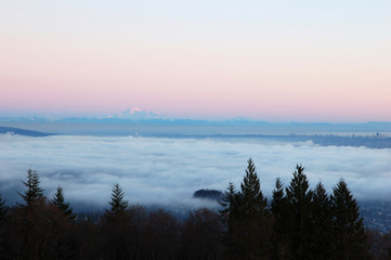 Wall Mural - cloudy and foggy sunset