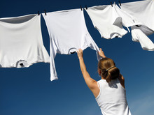 Girl, Blue Sky And White Laundry