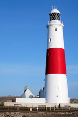 main red and white lighthouse on portland near wey