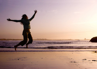 Sticker - jumping on the beach