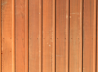 Wall Mural - stained wood wall background.