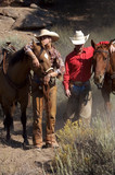 Fototapeta  - ranchers and their horses