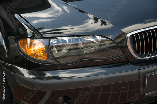 head lights of a car Wallpaper Mural
