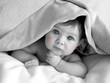 gorgeous baby under blanket