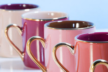 Row Of Colorful Coffee Cups