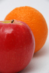 red apple and orange