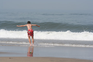 Wall Mural - boy making skimming