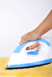 © Ronen - hand ironing the cloth