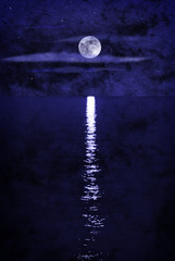 full moon over sea