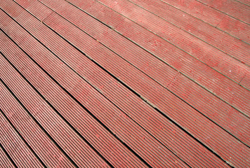 Wall Mural - red wood decking floor panels.