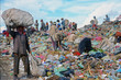 Leinwandbild Motiv poor people working in a rubbish dump