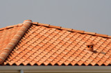 Fototapeta Desenie - tuiles du toit d'une maison en bois