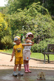 children near fountain