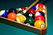 © Irina Shoyhet - racked pool balls, and a cue stick