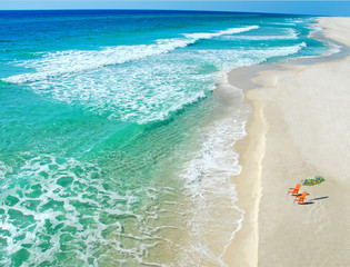 beach chairs and umbrella