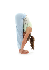 sporty girl practicing uttanasana standing forward bend