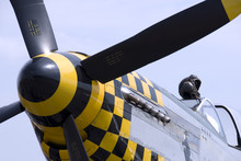 A Leather Flying Helmet Atop The Cockpit Of A P-51 Mustang.