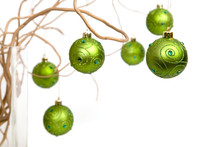 Green Christmas Baubles Hanging From Golden Curly Branches