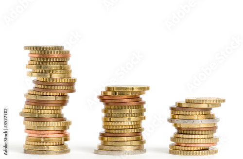 Fotografía Three stacks of euro coins on white background