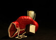canvas print picture - red boxing glove holding a shining cup 