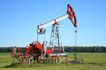 Wall Mural - Oil Pump Jack In a field