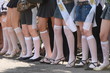 Row of schoolgirl legs in white socks 1