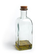 Square glass bottle with cork, filled with olive oil