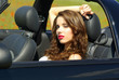 © ZoomTeam - woman in cabrio car