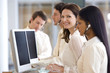 © carlosseller - Call center woman with colleagues