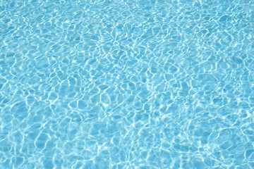 blue water of swimming pool at sunny day
