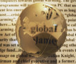 canvas print picture - crystal globe on newspaper