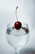 Glass of Water and A falling Cherry