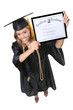 © Stephen Coburn - A pretty woman holding her certificate graduation