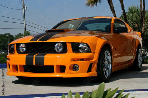 Obraz na plátne  orange american muscle car