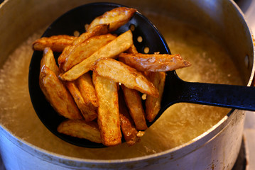 Wall Mural - Chips during frying